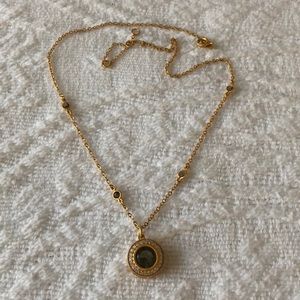 | Gold Tone + Crystal Pendant |